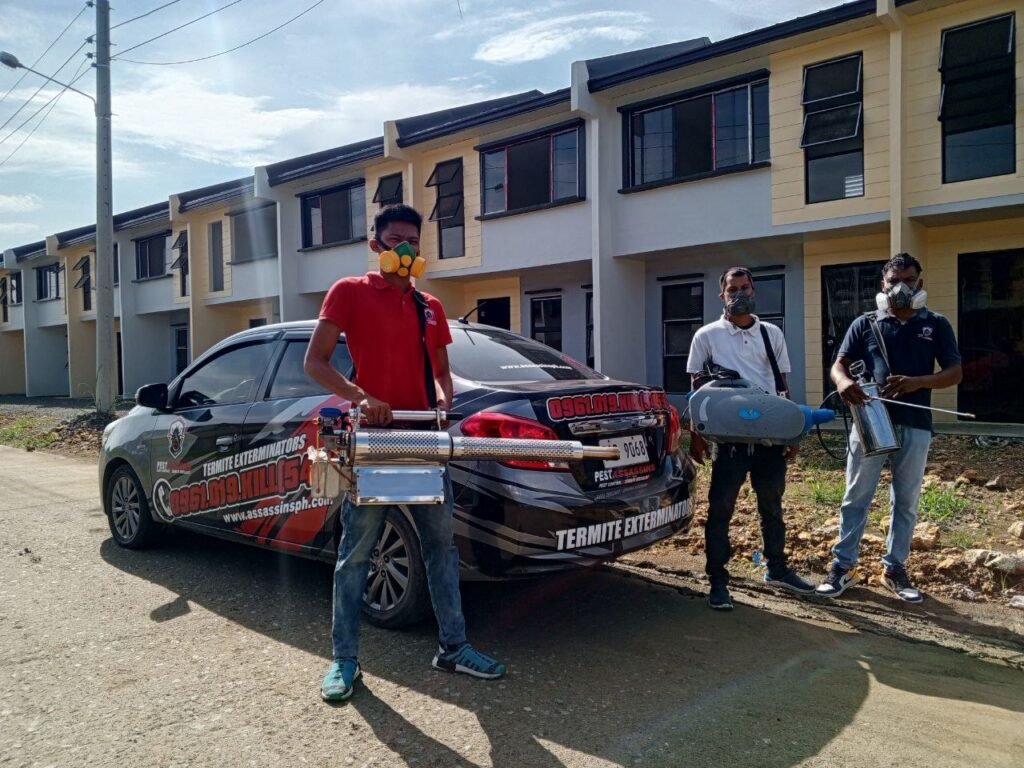 Pest Assassins Bohol Team with their Service Vehicle